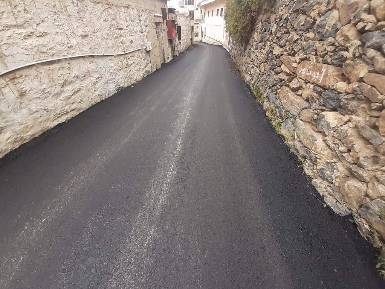 Asphalting, sidewalks and lighting for the municipality of Bani Hassan Governorate - the second phase